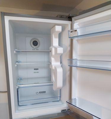 冰箱上面开着门不制冷（如何解决冰箱上面开着门不制冷的问题）