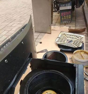 如何修理油烟机外壳的损坏（简易修复方法和关键工具）