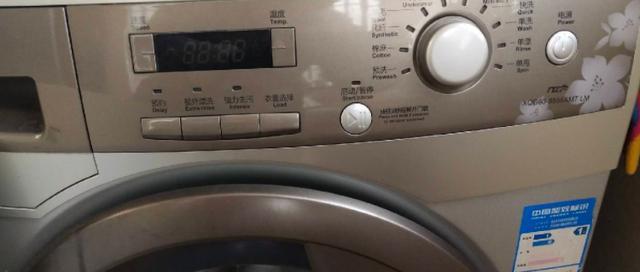 夏普洗衣机门打不开常见原因及维修方法（解决洗衣机门打不开问题的关键步骤和技巧）