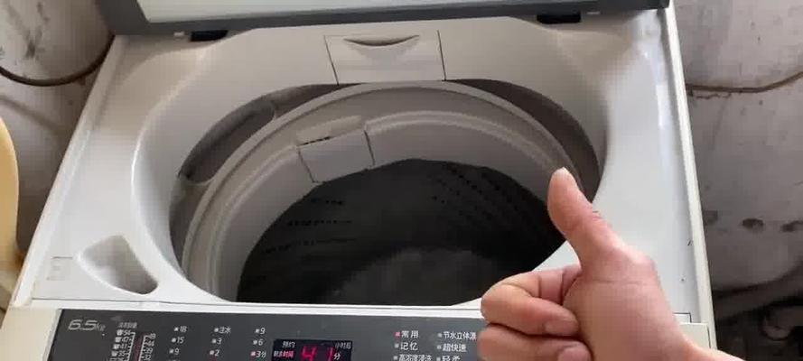 洗衣机E1故障维修指南（了解洗衣机E1故障）
