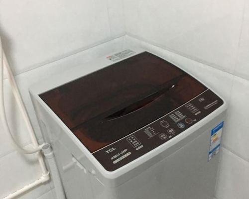 解除TCL滚筒洗衣机故障代码E3的方法（清理排水管即可）